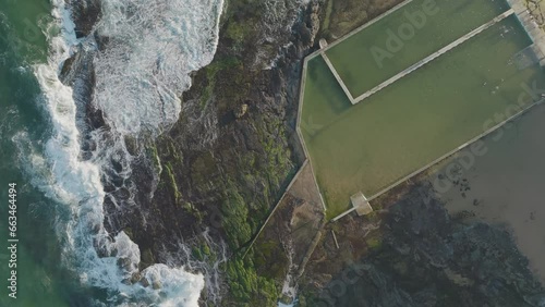 Aerial view of Narrabeen natural rock pool along the Narrabeen Lagoon, Sydney, New South Wales, Australia. photo