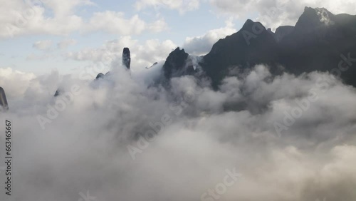 Aerial view of Serra dos Orgaos National Park with mountain landscape in low clouds, Teresopolis, State of Rio de Janeiro, Brazil. photo