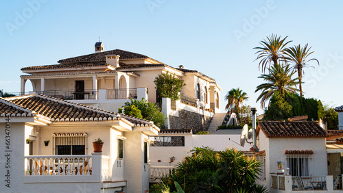 Mediterranean vacation houses with palm trees in Costa del Sol, Andalucia, Spain