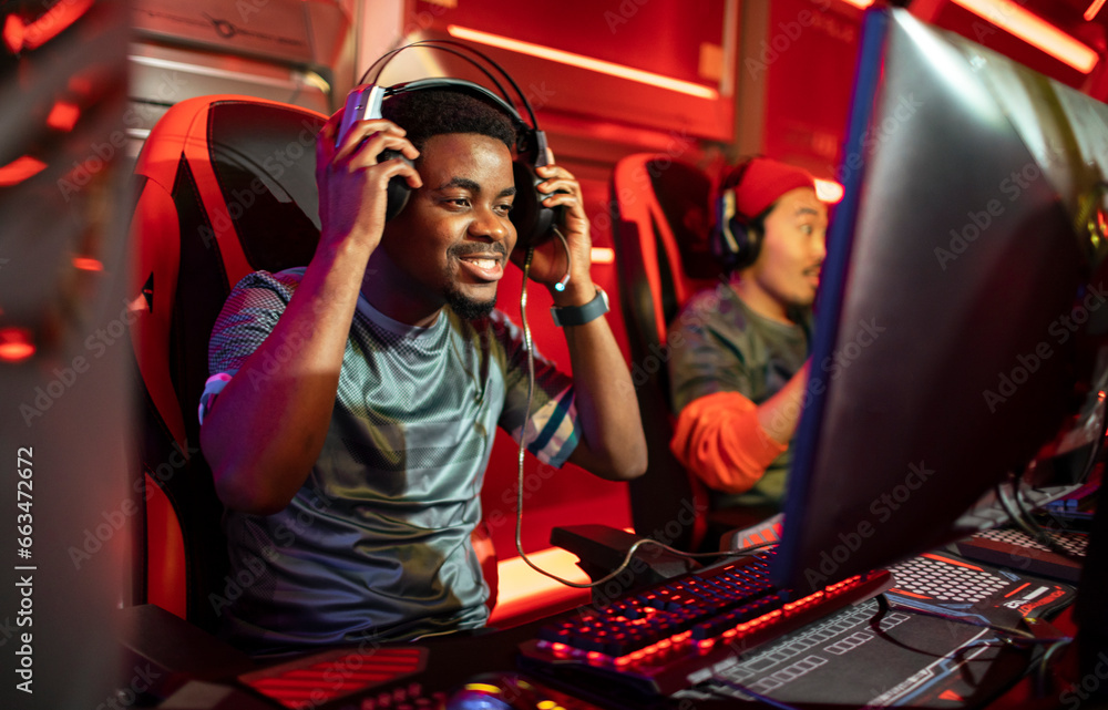 Professional young gamer participating in a tournament at the esports ...