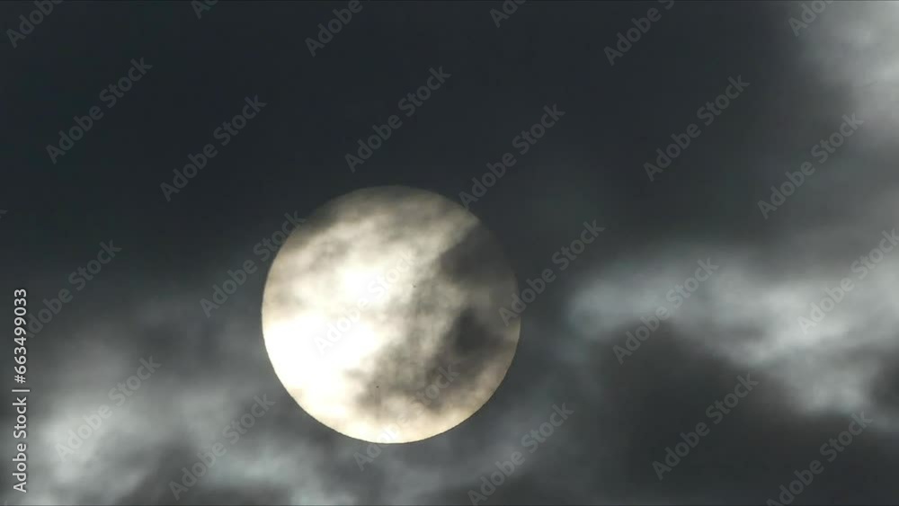 Cloudy sky, moving clouds, planet Mercury transit in Sun disc background with sunspots on May 9, 2016. Pollen floating in air from flowering trees and plants during spring pollen season - timelapse. Cloudy sky, moving clouds, planet Mercury transit in Sun disc background with sunspots on May 9, 2016. Pollen floating in air from flowering trees and plants during spring pollen season - timelapse.