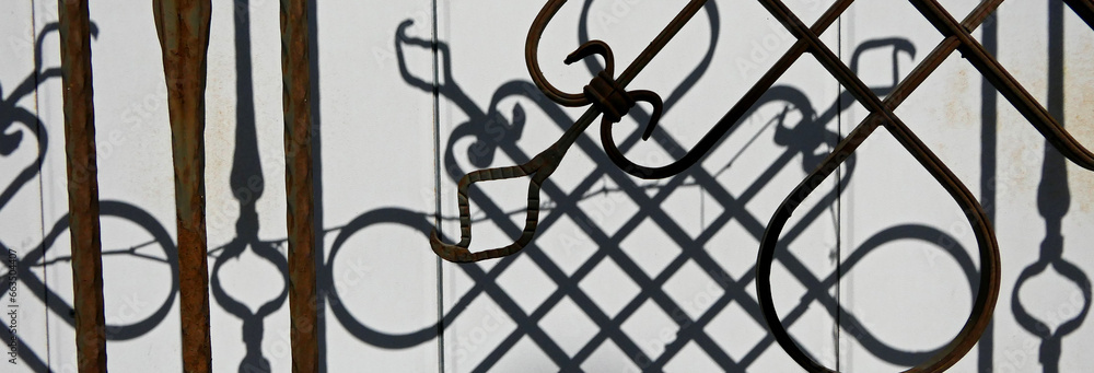 old rusty wrought iron fence