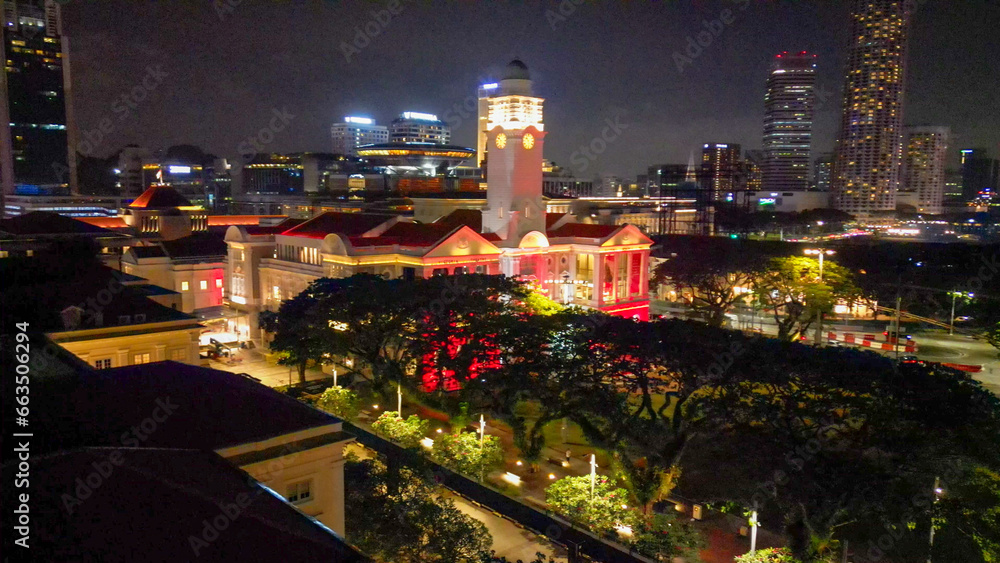 Aerial view of Boat Quay and Singapore skyline from Cavenagh Bridge at night