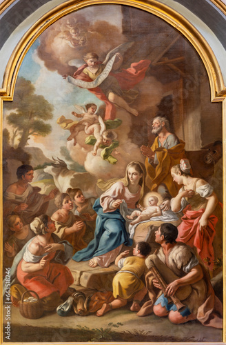 NAPLES, ITALY - APRIL 23, 2023: The painting of Adoration of shepherds in the church Chiesa di San Nicola alla Carita by Francesco de Mura from 18. cent.