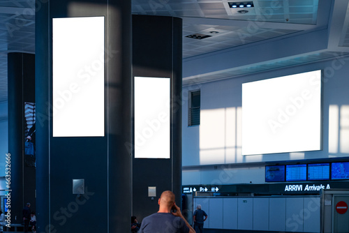 Billboards inside an airport building in Italy. photo