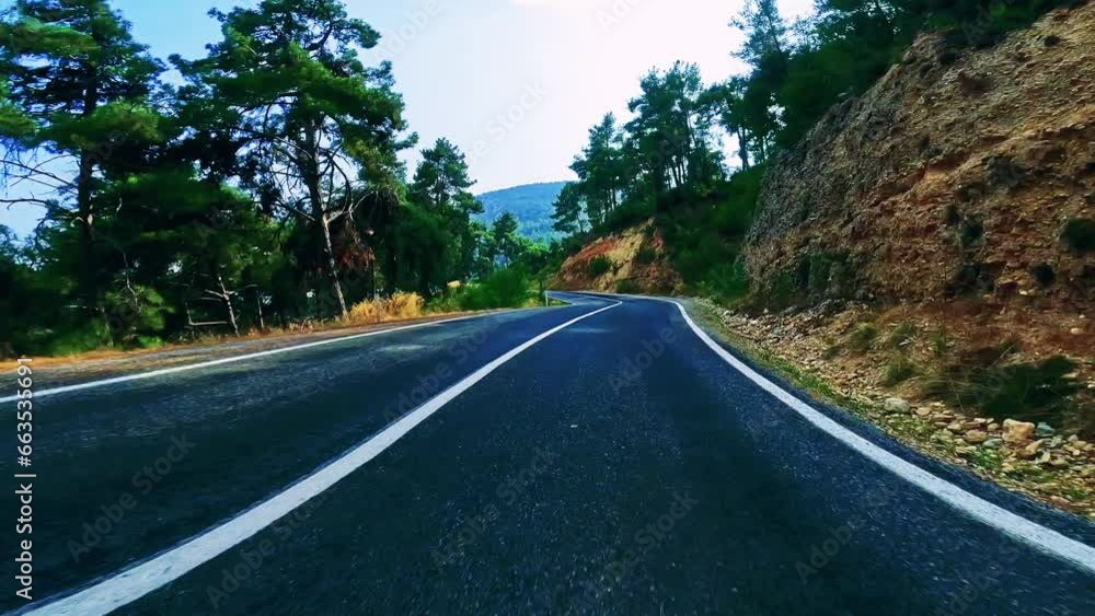 Drive on mountain road with black asphalt. Travel by car, first-person view. Drive on mountain road with black asphalt. Travel by car, first-person view.