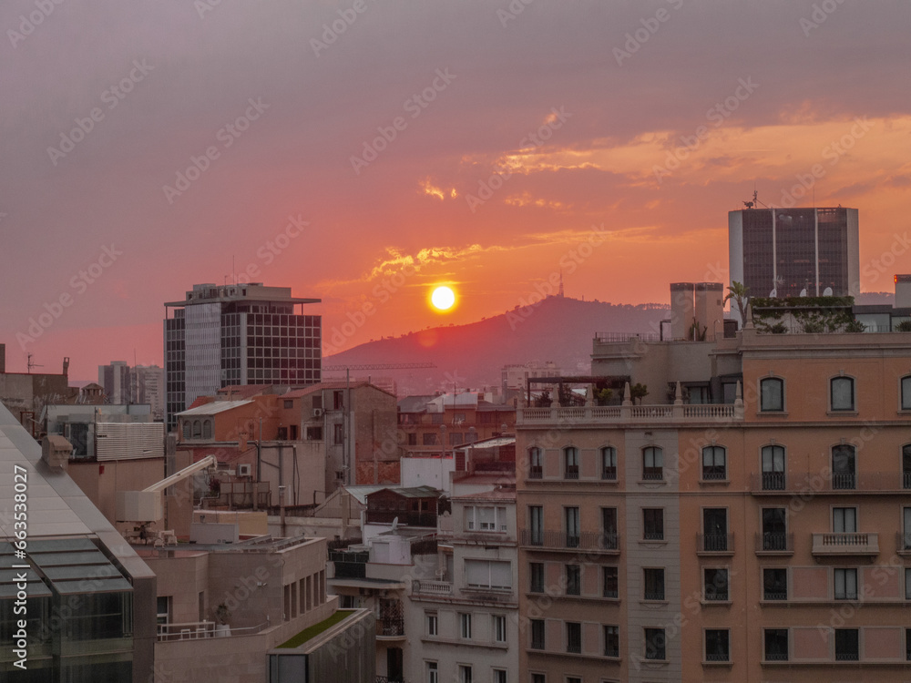 Sunset over several buildings