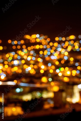 Blurred citylights in illuminated Wadi Musa, Jordan © A. Emson