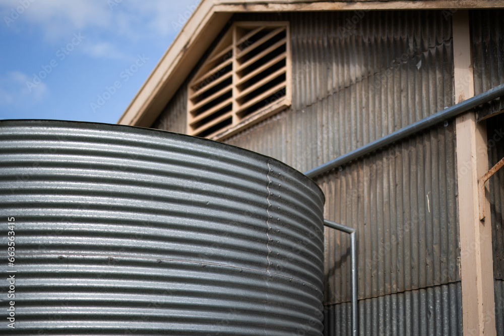 Fototapeta premium Water tank corrugated iron store shed old industrial sustainable reuse recycle