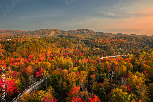 Aerial view of winding river in Laurentian mountains, Quebec, Canada during the fall foliage