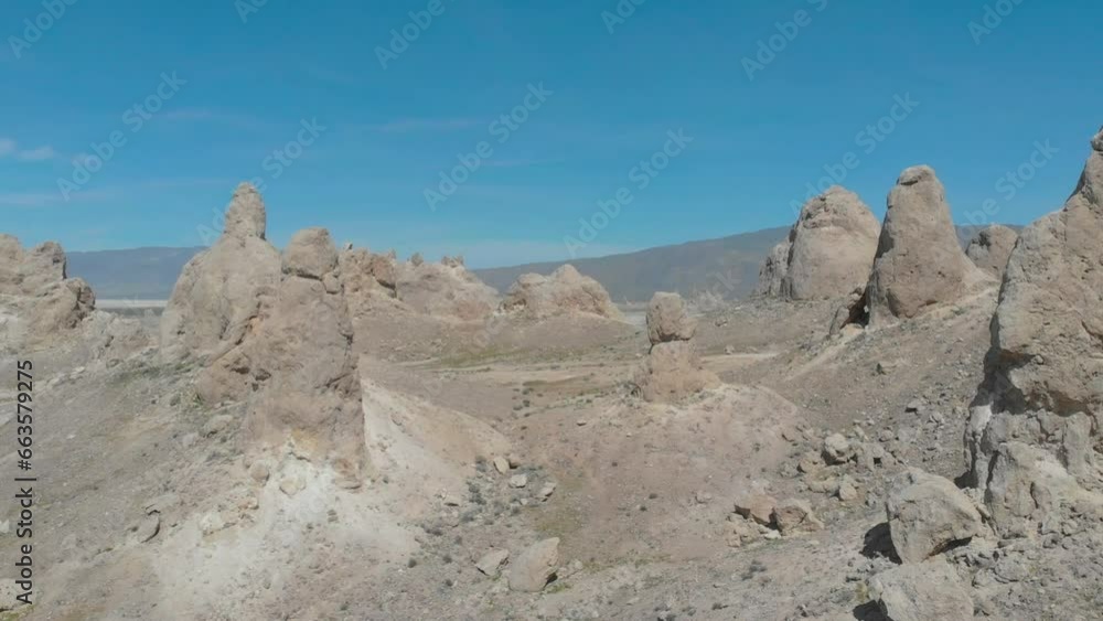 Drone flying betreen the rocks of the trona pinnacles in the california desert at sunrise 4k Drone flying betreen the rocks of the trona pinnacles in the california desert at sunrise 4k