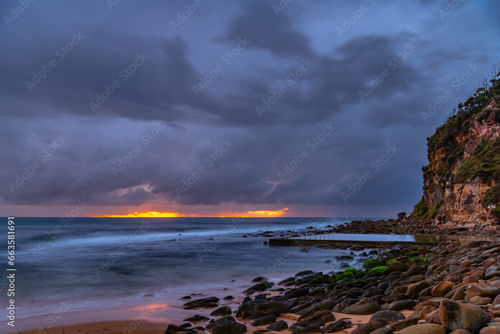 Wet weather sunrise seascape