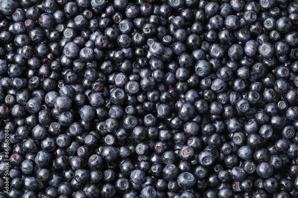 Many delicious ripe bilberries as background, top view Many delicious ripe bilberries as background, top view