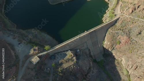 aerial view from above and in a circle over the Ayagaures dam on the island of Gran Canaria and on a sunny day. photo