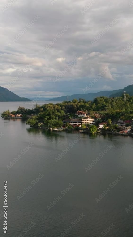 Tuktuk Village with hotel located on Samosir Island, Toba lake. Sumatra, Indonesia. Tuktuk Village with hotel located on Samosir Island, Toba lake. Sumatra, Indonesia.