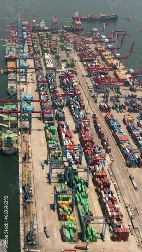 Sea cargo port with containers and cranes view from above. Tanjung Priok port. photo