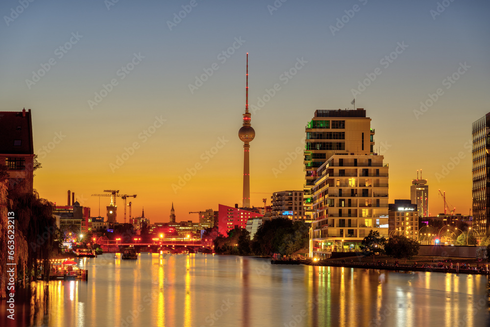 The famous TV Tower and the Spree river in Berlin after sunset