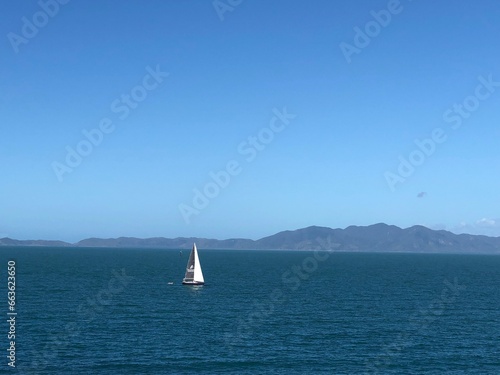 Sailboat boat sailing across a lake