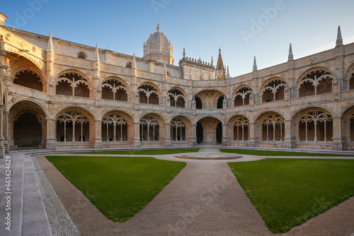 Jeronimos Monastery In Lisbon. Wide angle photo during sunset with the interior courtyard of this landmark church from Lisbon, Portugal.