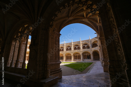 Jeronimos Monastery In Lisbon. Wide angle photo during sunset with the interior courtyard of this landmark church from Lisbon, Portugal. photo