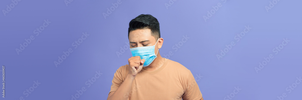 Asian man wearing a face mask with coughing Asian man wearing a face mask with coughing