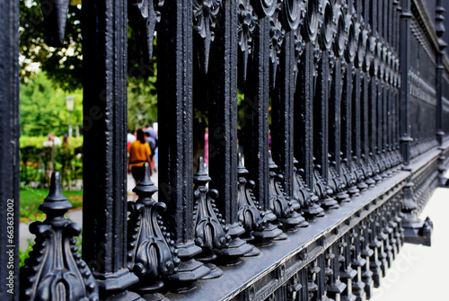 Photography heavy black cast iron fence