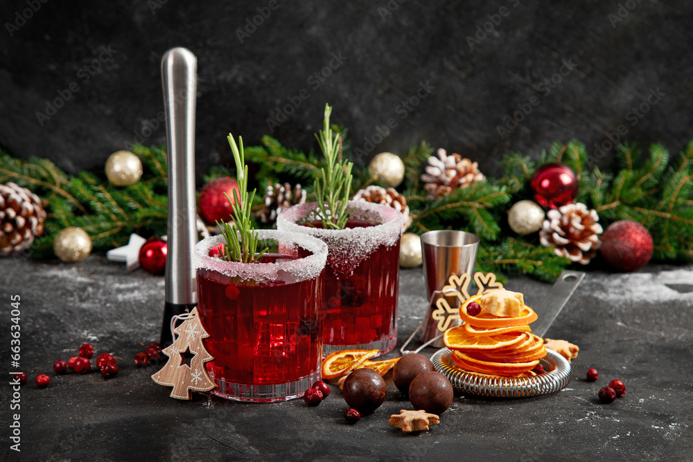 Fototapeta premium Red christmas cocktail with cranberries in a glasses.