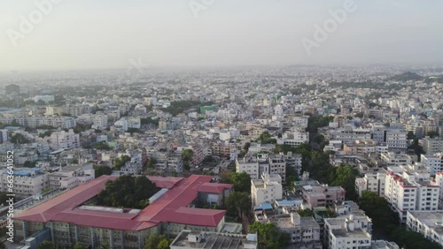 Telangana-based South Indian city's residential and commercial areas are visible in aerial footage. appears from above. urban centre for commerce and one of Hyderabad photo