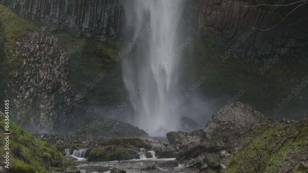 Rocks at the bottom of a waterfall in the pacific northwest Rocks at the bottom of a waterfall in the pacific northwest
