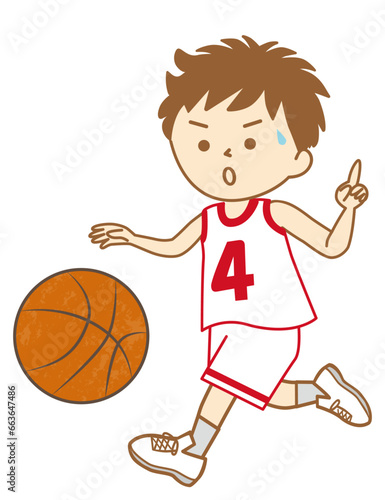 ユニフォーム姿でバスケットボールの試合でドリブルをする男の子