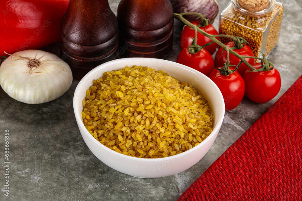 Dry wheat bulgur cereal heap Dry wheat bulgur cereal heap