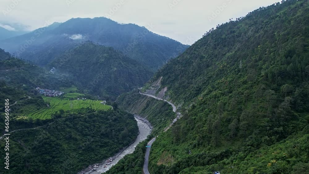 Drone view of picturesque highland landscape and harsil valley with bhagirathi river Drone view of picturesque highland landscape and harsil valley with bhagirathi river