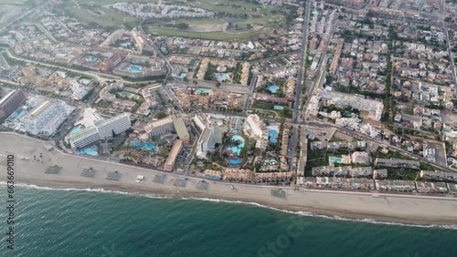aerial footage of the beautiful coast of roquetas de mar at spains mediterrean, filmed by drone photo