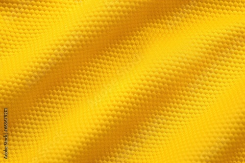 Yellow color football jersey clothing fabric texture sports wear background  close up.
