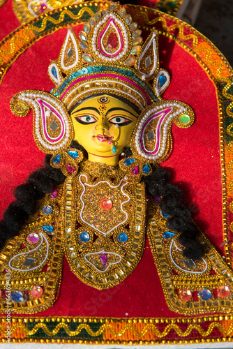 Decorated idol of Hindu Goddess Durga with use of selective focus