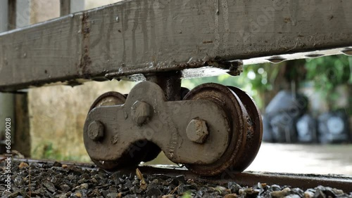 Iron wheels of a rusted iron gate, house fence, 3 video clips