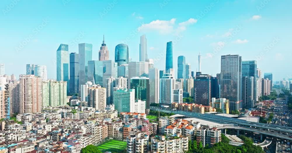 Aerial view of Guangzhou city financial district skyline. Removed building trademark and advertising Aerial view of Guangzhou city financial district skyline. Removed building trademark and advertising