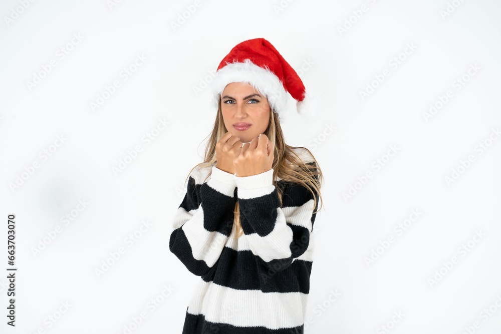 Young beautiful woman Ready to fight with fist defense gesture, angry and upset face, afraid of problem. Young beautiful woman Ready to fight with fist defense gesture, angry and upset face, afraid of problem.