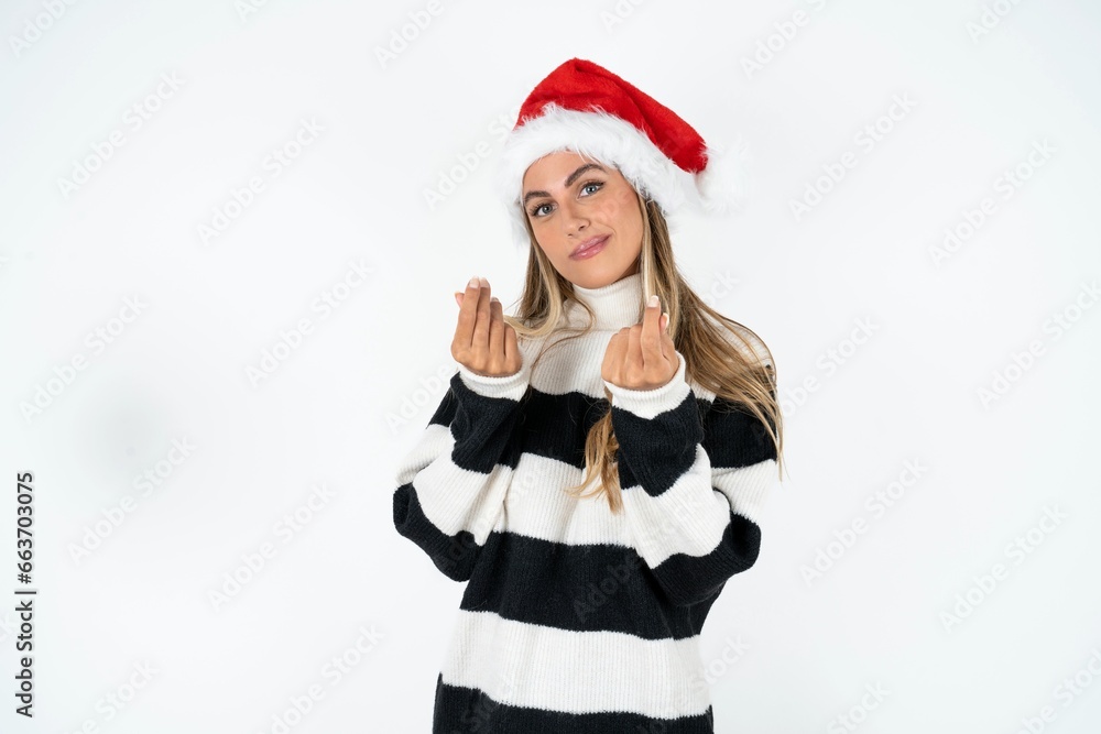 Young beautiful woman doing money gesture with hands, asking for salary payment, millionaire business