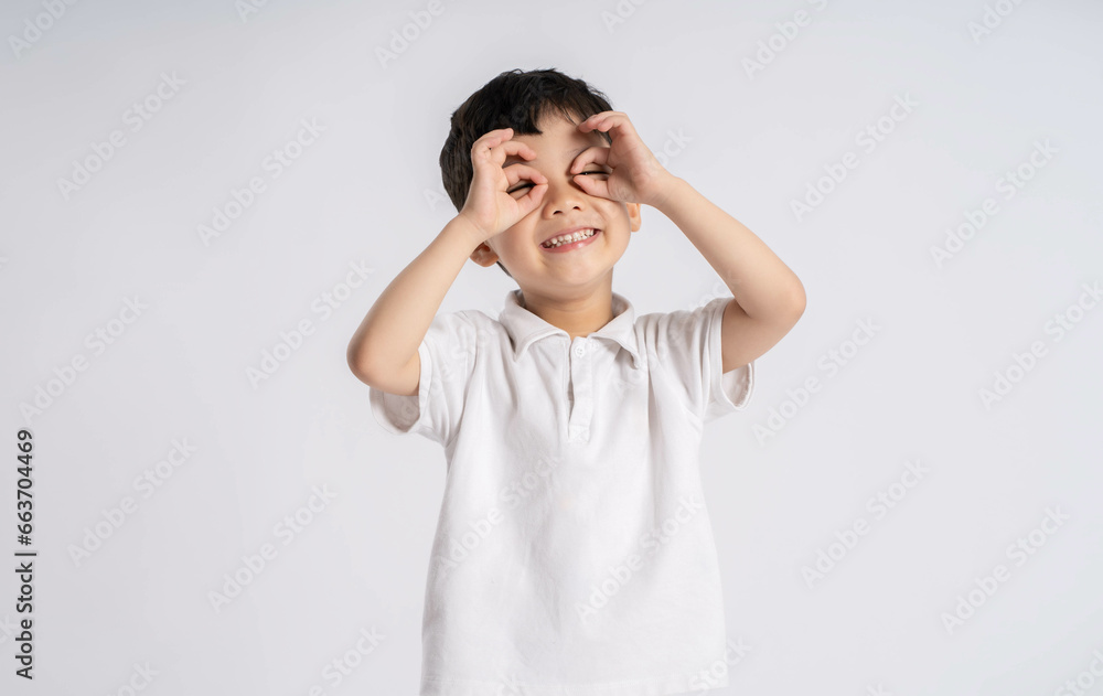 Portrait of asian boy posing on white background Portrait of asian boy posing on white background