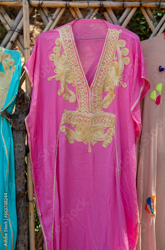 Moroccan traditional pink woman dress closeup in Morocco © isabela66