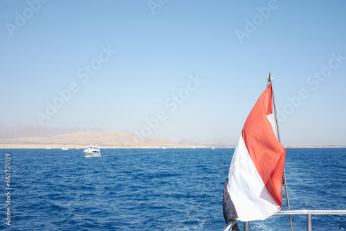 Egyptian flag against the sea
