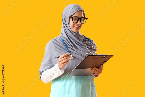 Smiling muslim female docto...