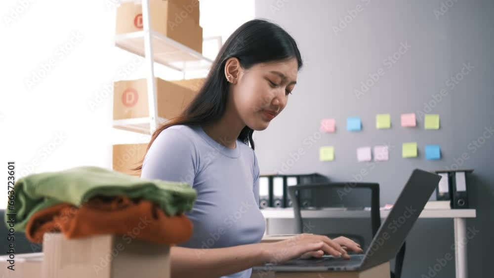 Starting small businesses SME owners female entrepreneurs working on receipt box and check online orders to prepare to pack the boxes, sell to customers, sme business ideas online. Starting small businesses SME owners female entrepreneurs working on receipt box and check online orders to prepare to pack the boxes, sell to customers, sme business ideas online.