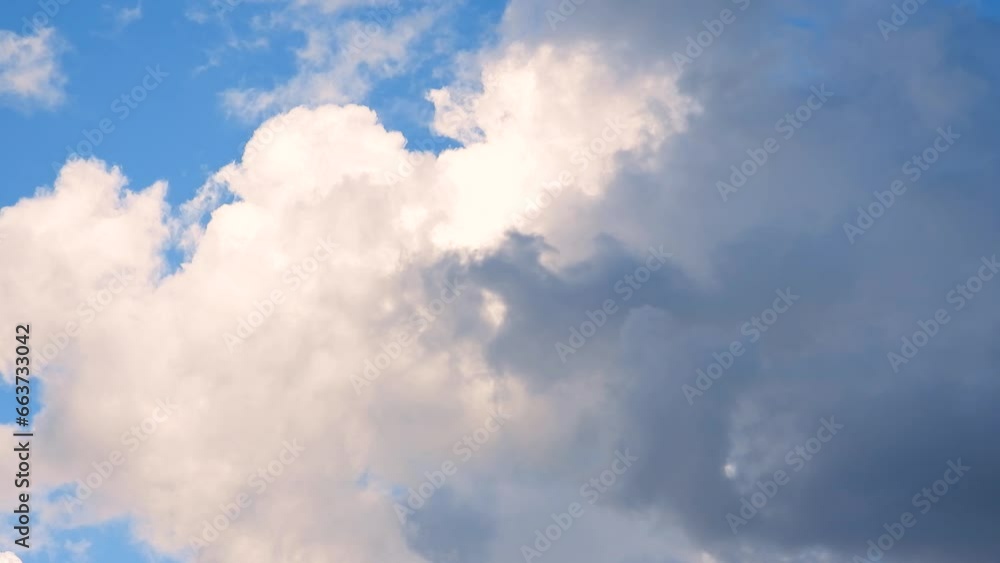 Cumulonimbus Clouds Against Blue Sky In Daytime. low angle, timelapse Cumulonimbus Clouds Against Blue Sky In Daytime. low angle, timelapse