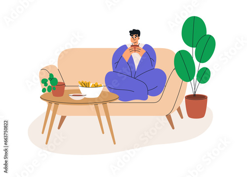 Happy person relaxing at home, sitting on sofa, warming with tea cup. Man resting on cozy couch, wrapped in blanket in cold weather in apartment. Flat vector illustration isolated on white background