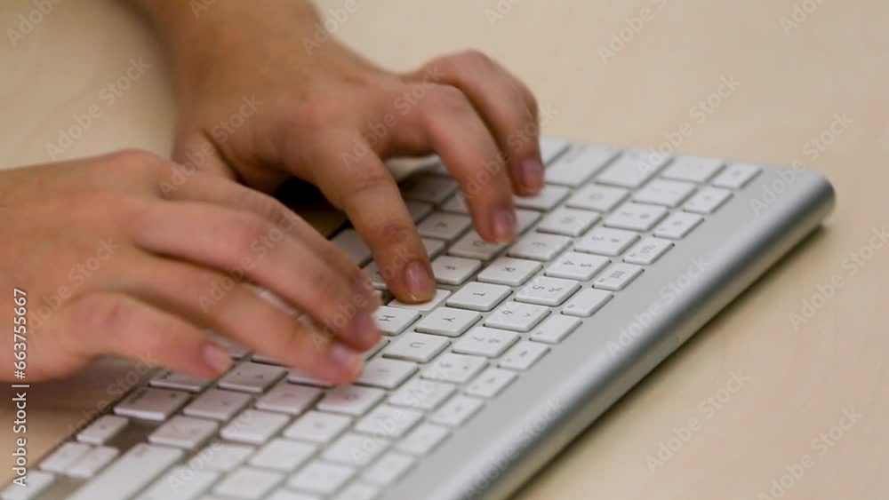 businessman at work in the office. A copywriter is writing text on a computer keyboard businessman at work in the office. A copywriter is writing text on a computer keyboard