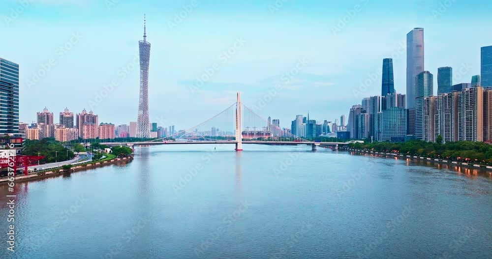 Aerial view of Guangzhou city financial district skyline at sunrise. Removed building trademark and advertising Aerial view of Guangzhou city financial district skyline at sunrise. Removed building trademark and advertising