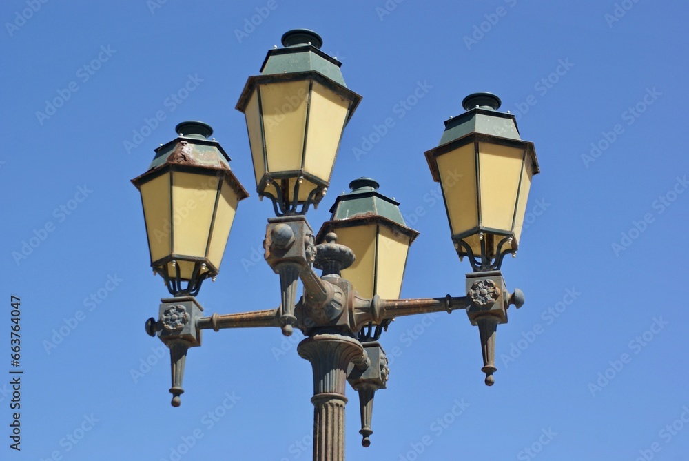 Historical metal street lantern in Faro, Algarve - Portugal Historical metal street lantern in Faro, Algarve - Portugal