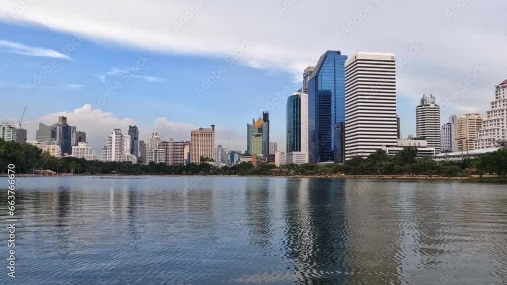 Beautiful 4K Timelapse Reverse Shot of Lake Ratchada at Benjakitti Park, Bangkok Thailand. Beautiful 4K Timelapse Reverse Shot of Lake Ratchada at Benjakitti Park, Bangkok Thailand.